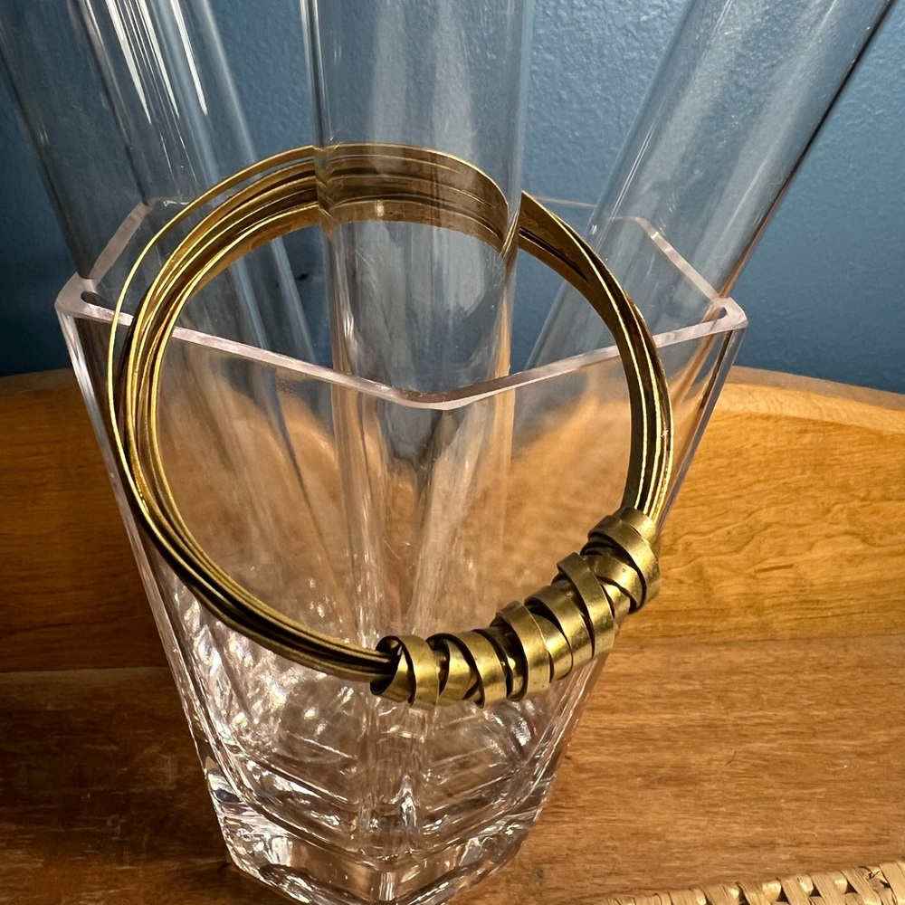 Brass ribbon wrap bangle